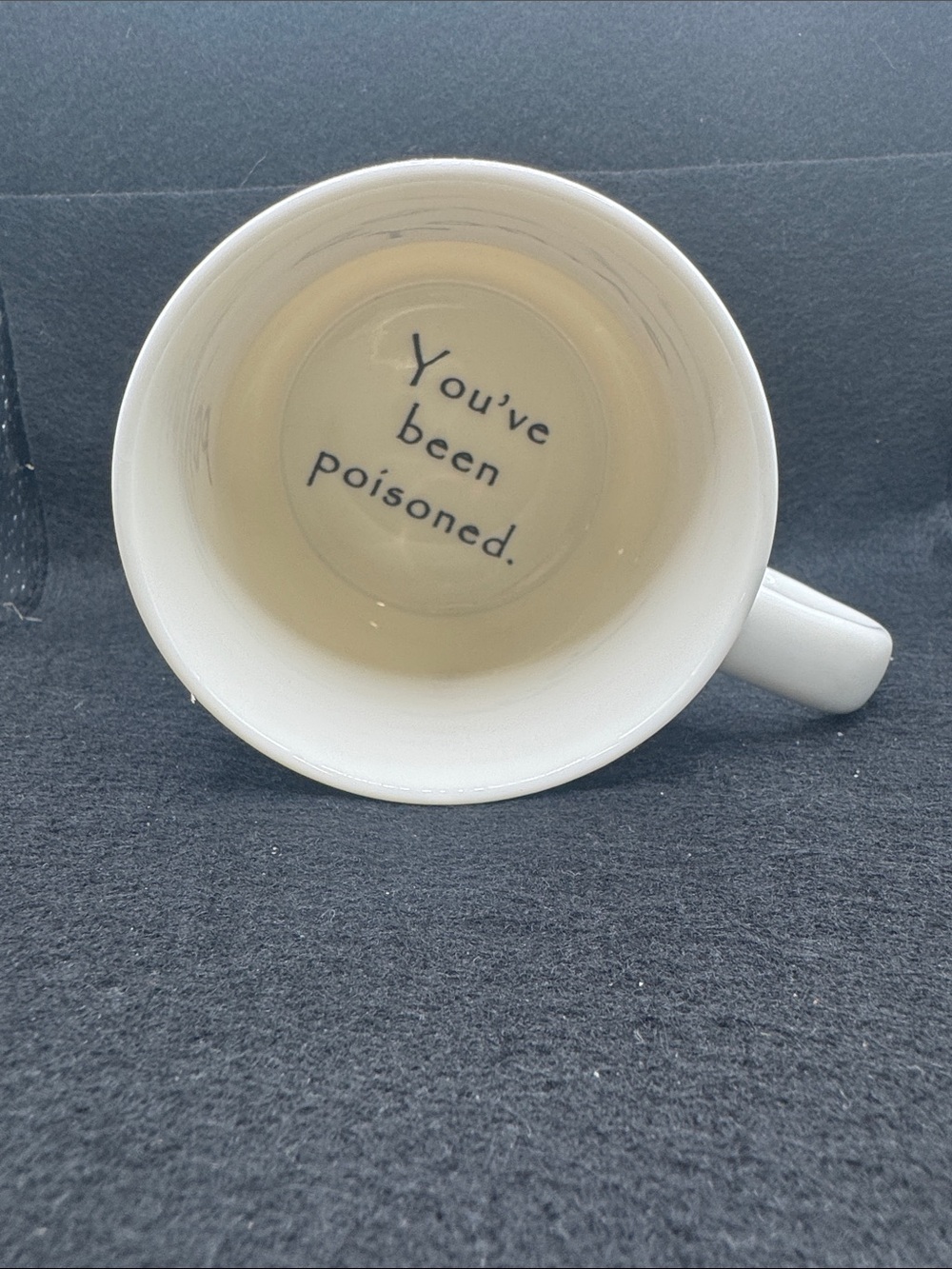 Caterpillar White Ceramic Mug with Black Interior Message